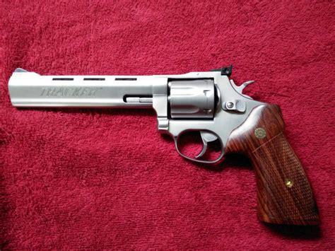 44 magnum with a 6 shot capacity and a 8 1/2″ barrel made in August of 1994. . Taurus m44 grips